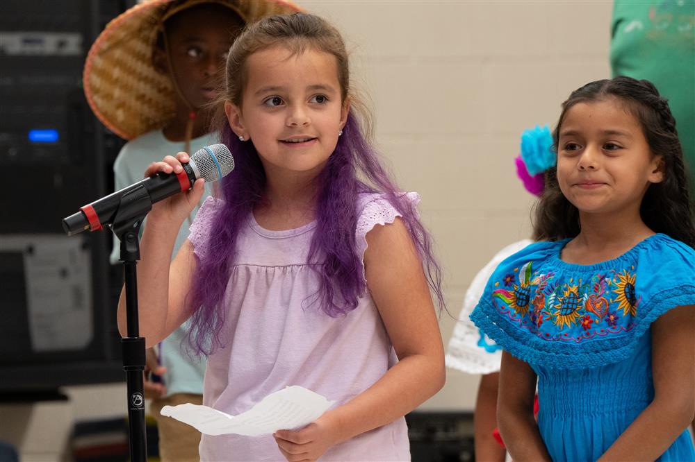 Students celebrate their diverse cultures and backgrounds during Bologna Elementary School's Celebration of Nations assembly.